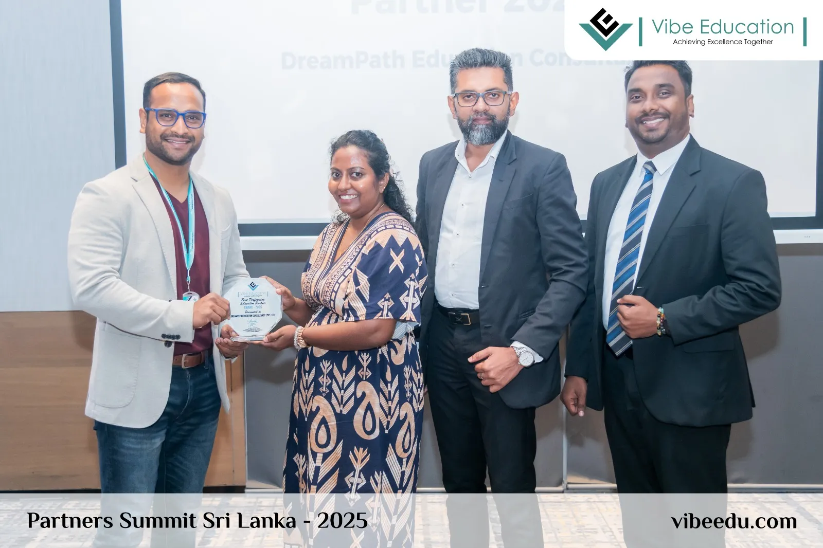 Vibe Education handing DreamPath its Best Performing Education Partner 2025 award