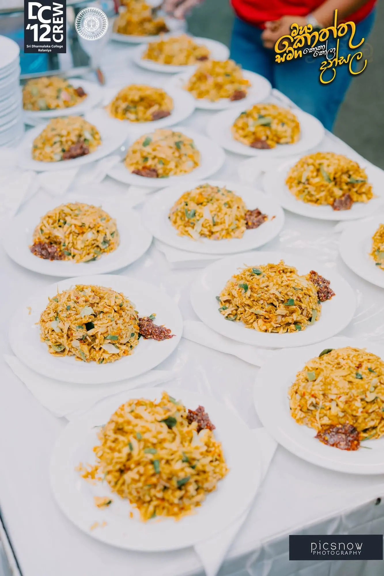 Plates of kottu ready to be served at the Sri Dharmaloka College Kottu Dansala