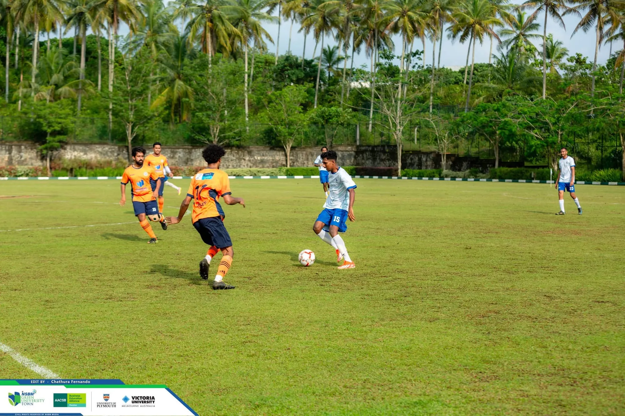 NSBM Alumina players in the DreamPath jersey with the ball, mid-match