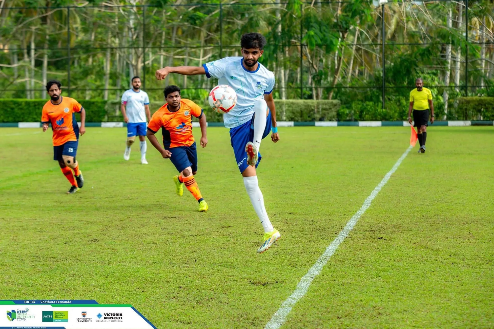 A challenge for the ball between NSBM Alumina players in the DreamPath jersey and their opponents