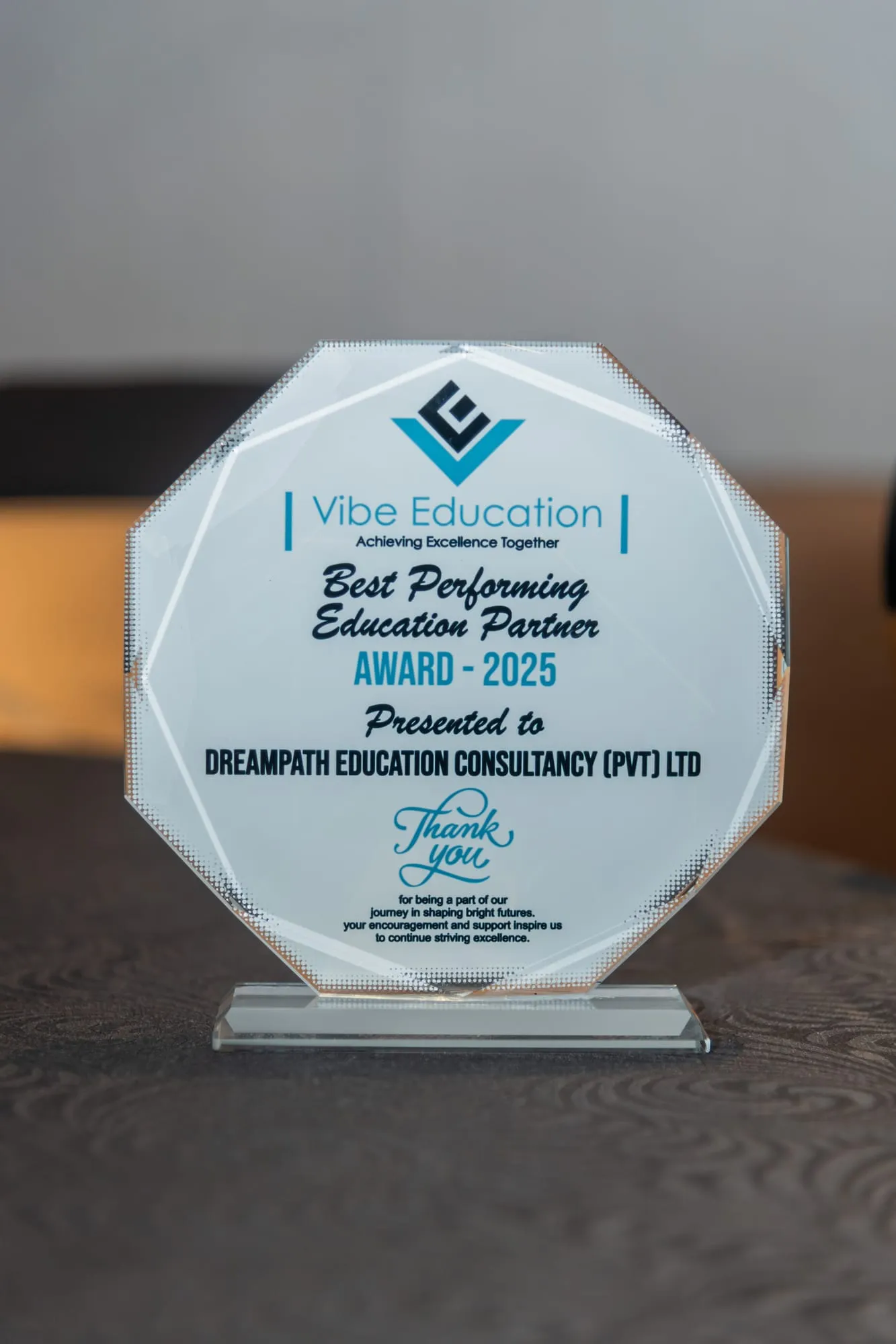 Vibe Education's Best Performing Education Partner 2025 trophy, presented to DreamPath Education Consultancy