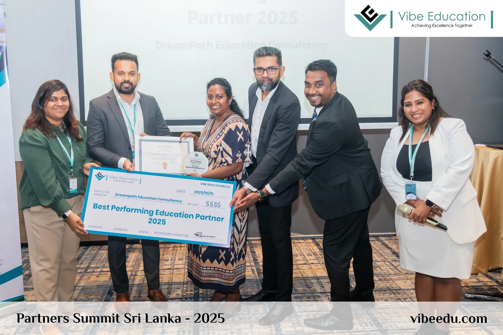 The DreamPath team on stage holding the certificate for Vibe Education's Best Performing Education Partner 2025 award